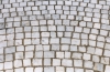 Naturstein Kopfsteinpflaster aus weissem Marmor